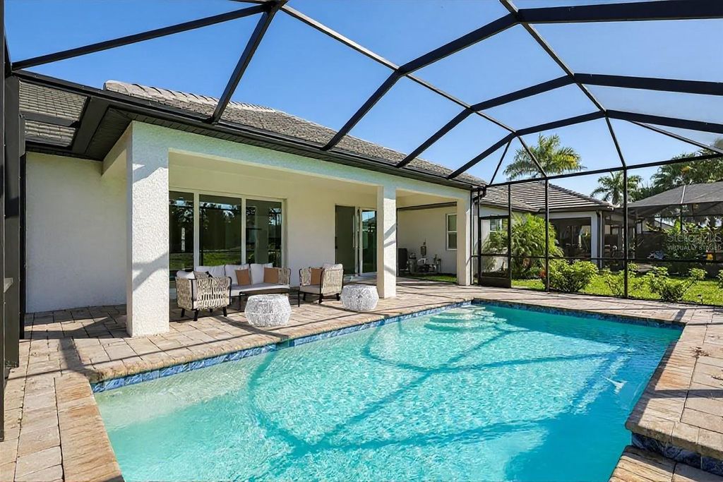 Photo of 19803 Bridgetown Loop, Venice, FL 34293 (MLS # C7519871)