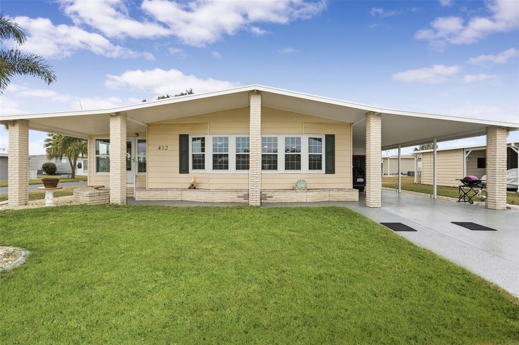 Photo of 412 La Sala, North Port, FL 34287 (MLS # TB8475719)