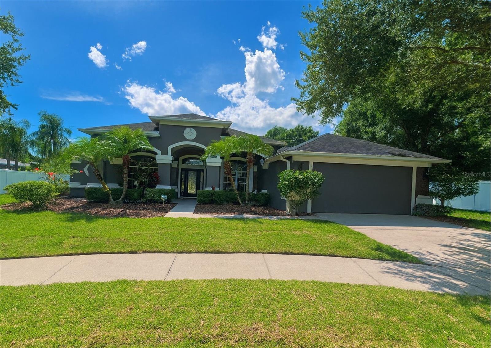 One or more photo(s) has been virtually staged. Gated Windermere Chase on a quiet cul-de-sac with true everyday convenience—sidewalks to Thornebrooke Elementary, Publix, Keke’s, coffee and more. Inside, the home’s most significant upgrade takes center stage: new PORCELAIN tile flooring throughout (no carpet) for a cohesive, durable, easy-care finish in every room. Fresh interior paint keeps everything light and move-in ready.
The plan lives large. An oversized family room anchors daily life and opens via a French door to the screened lanai and sparkling pool with raised spa. When entertaining, the formal living room also connects outdoors through sliding glass doors—two easy exits for seamless indoor-outdoor flow. The pool deck was just painted, giving the lanai a crisp, low-maintenance finish for morning coffee, weekend barbecues, and sunset swims.
The kitchen is bright and functional with solid wood cabinetry, new quartz countertops, new appliances, and a breakfast bar that keeps the cook connected to the action. A formal dining area handles holidays and dinner parties; casual meals spill naturally to the lanai.
The split-bedroom layout provides privacy for the primary suite, a calm retreat with room for a sitting area, a spacious bath with dual vanities, soaking tub, separate shower, and a walk-in closet. Three secondary bedrooms flex for guests, office, fitness, or hobbies—whatever your season of life requires. An inside laundry room and an attached garage add day-to-day convenience. The lot offers generous yard space and mature landscaping for an established, finished feel.
Windermere Chase is a gated, well-kept enclave with tree-lined streets and a low-traffic neighborhood vibe—ideal for evening strolls and bike rides. Everyday access is dialed in: minutes to SR-408, SR-429, and the Turnpike; close to shopping, dining, golf, area hospitals, Restaurant Row, downtown Orlando, and the attractions. Zoned schools are in demand (Thornebrooke Elementary, Gotha Middle, Olympia High—buyer to verify).
Highlights & recent updates (ordered by impact): whole-home porcelain tile flooring (no carpet); oversized family room; French door from family room to lanai; sliders from formal living to lanai; freshly painted pool deck; screened pool with raised spa; fresh interior paint; kitchen with solid wood cabinets, new quartz counters, and new appliances; split plan with generous primary suite; walkable to Thornebrooke, Publix, Keke’s, coffee and more.
Seller’s disclosure and feature sheet available upon request. Room sizes, HOA details, and school zoning to be independently verified by buyer. Flexible closing to match your timing.