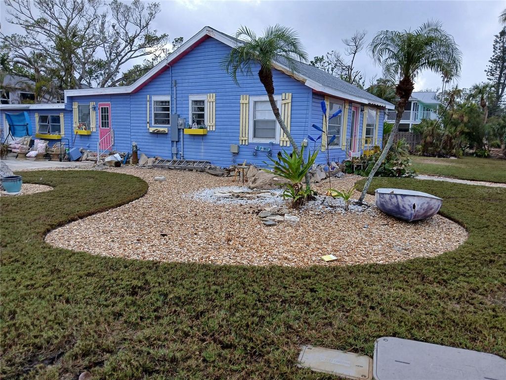 Photo of 7061 Longboat Drive E, Longboat Key, FL 34228 (MLS # A4635108)