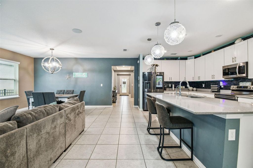 Photo of 8207 Abalone Loop, Parrish, FL 34219 (MLS # TB8432689)