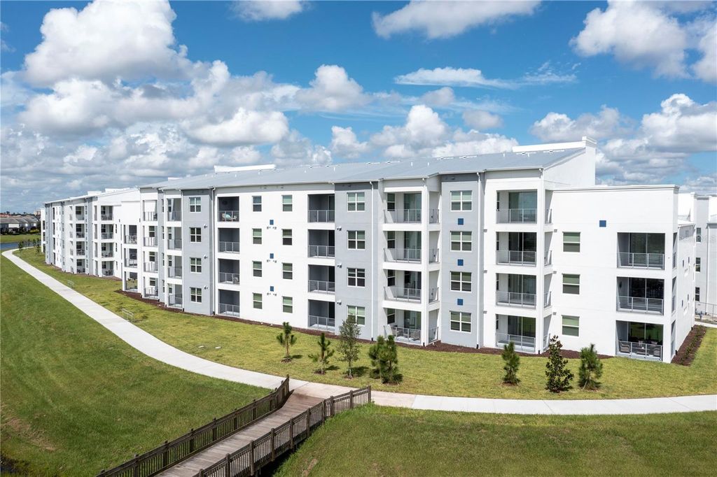 Photo of 3161 Paradox Circle #403, Kissimmee, FL 34746 (MLS # O6387522)