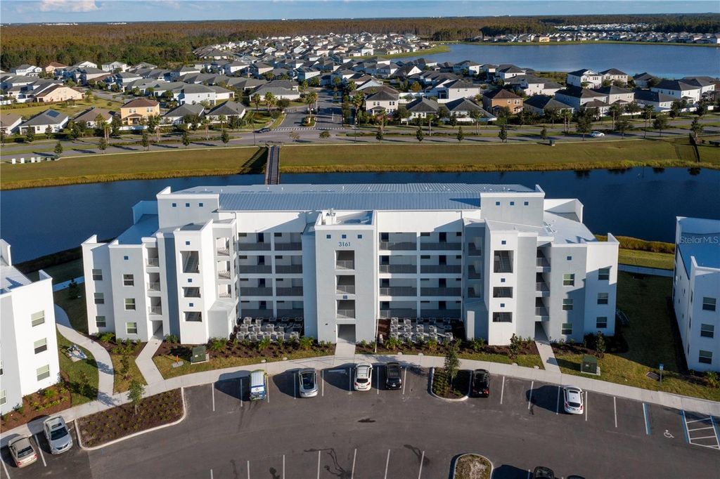 Photo of 3161 Paradox Circle #403, Kissimmee, FL 34746 (MLS # O6387522)