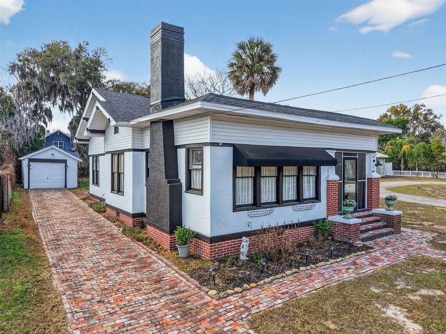 This exceptional and highly desirable 100-year-old cottage, fully renovated with a new roof and updated electrical system, is situated in the historic heart of Eustis. Located within the sought-after neighborhood near Lake Gracie, this classic 1925 residence offers both timeless elegance and modern enhancements. The property boasts convenient access to downtown Eustis and Mount Dora.
Beautifully maintained, this two-bedroom, one-bath home marries original vintage features with selective contemporary updates. Key elements include ceiling fans, stone & butcher block kitchen countertops, and appliances installed within the last 18 months. Other distinguishing characteristics are the original wood flooring, a stained-glass bathroom window, built-in shelving/cabinets in the kitchen & dining room, and a traditional wood-burning fireplace in the living room, all contributing to its enduring appeal.
Additional amenities enhance this charming Florida property, such as screened front and back porches for expanded living space, French doors that promote openness throughout the interior, and a spacious backyard awaiting personalization. The home is set on a quiet street and includes a partially fenced backyard, plus a detached garage and shed suitable for workshop or storage needs. This property is ideal for those who appreciate vintage architecture and design. Please note: certain personal items are excluded from the sale on the interior and exterior of the home.

Blind offers will not be considered; prospective buyers must physically view the property. No hard money loans or wholesalers will be accepted