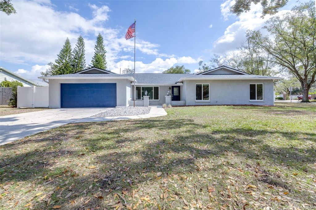 Photo of 15401 Woodcastle Place, Tampa, FL 33613 (MLS # TB8450683)