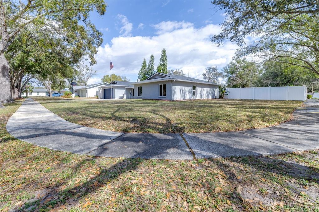 Photo of 15401 Woodcastle Place, Tampa, FL 33613 (MLS # TB8450683)