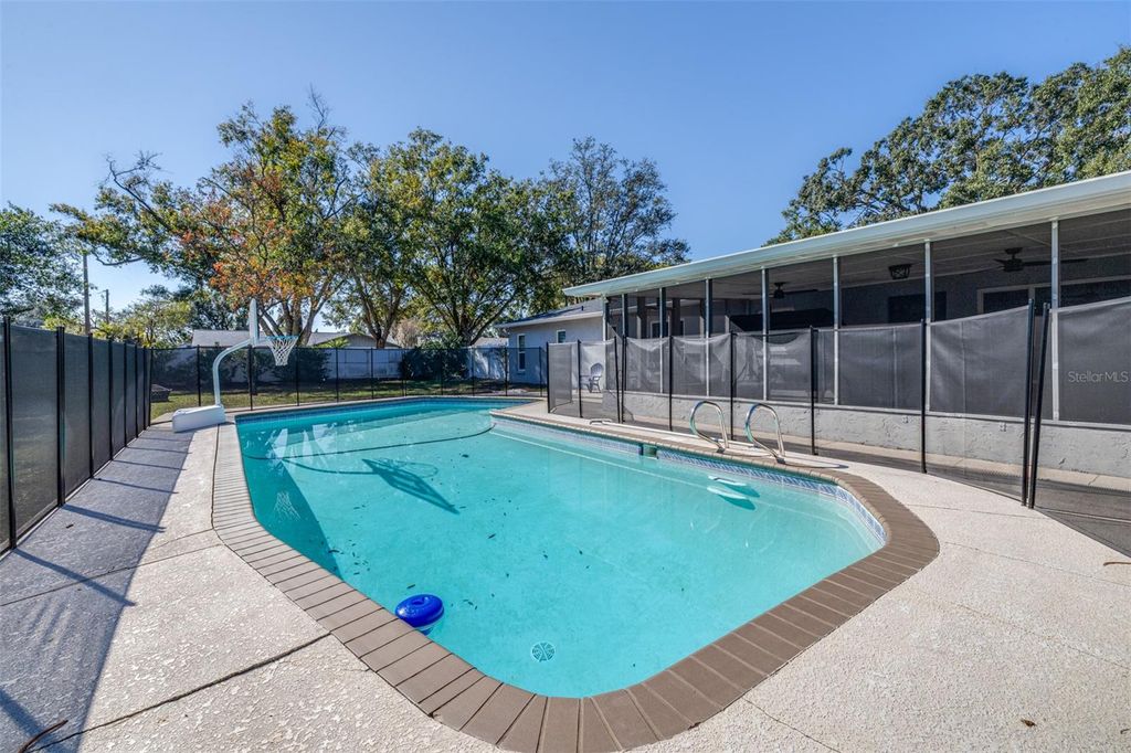 Photo of 15401 Woodcastle Place, Tampa, FL 33613 (MLS # TB8450683)