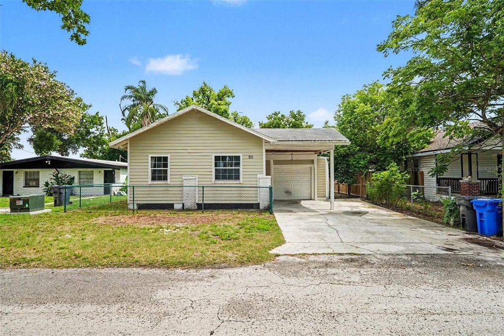 Photo of 911 E 123rd Avenue, Tampa, FL 33612 (MLS # TB8526988)