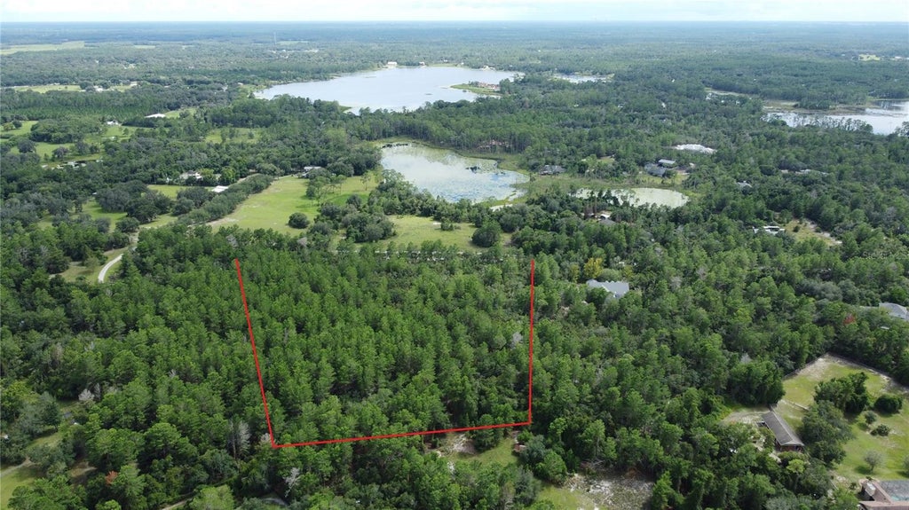 Photo of 264 Seminole Woods Boulevard, Geneva, FL 32732 (MLS # O6438877)