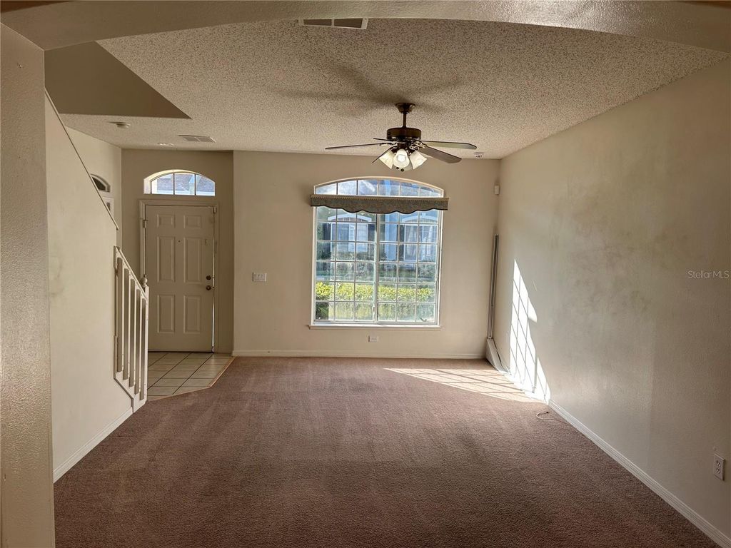 Photo of 1842 Island Walk Drive, Orlando, FL 32824 (MLS # O6381285)