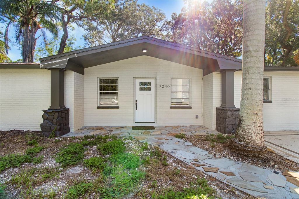 Photo of 7040 Morningstar Lane, New Port Richey, FL 34652 (MLS # TB8433416)