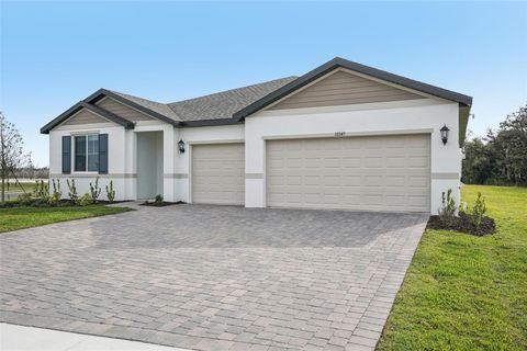 Photo of 10547 Abundance Grove Way, Parrish, FL 34219 (MLS # TB8427276)