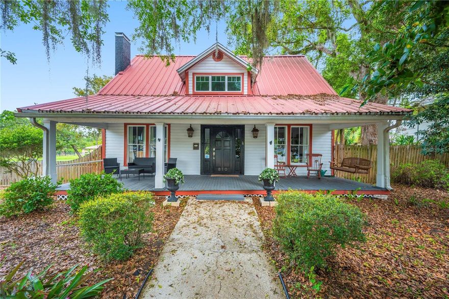 Welcome home to this farm-style craftsman in the heart of historic downtown Bartow! Nestled on a 0.24-acre fully
fenced corner lot, this stunning property exudes character with its charming red metal roof and barn-style frame. The
expansive front porch, adorned with large windows, invites natural light into the living room, creating a warm and
welcoming ambiance. Venture inside to find hardwood flooring throughout the home, complemented by original
terracotta red vintage tile in the kitchen. The open-concept layout features multiple sitting areas and high ceilings,
enhancing the airy and connected feel of the space. The farmhouse kitchen is a chef's delight, boasting butcher block
countertops, floating shelves, stainless steel appliances, and a charming transom window. The primary bedroom on the
main floor is spacious and stylish, complete with a shiplap accent wall and a cozy sitting nook. The primary bathroom is
a showstopper, featuring a walk-in shower, concrete floors, a double sink vanity, and a sunken tub with a ceiling water
spout! Downstairs, you’ll find a convenient half bath for guests and a well-appointed laundry room. Journey upstairs to
discover 3 additional bedrooms and 2 full bathrooms. Two of the bedrooms are mirror images of each other, each with
ensuite bathrooms showcasing black and white historic-style tile. Both upstairs bedrooms are equipped with 2024 mini
split A/C units for peace of mind and comfort for years to come. The large backyard provides ample space for outdoor
activities, and the side parking and outdoor shed adds convenience. Enjoy close proximity to Bartow’s thriving
downtown, including boutique shops, cafes, restaurants, and more! Don’t miss the opportunity to make this 1930s
farmhouse your own!
