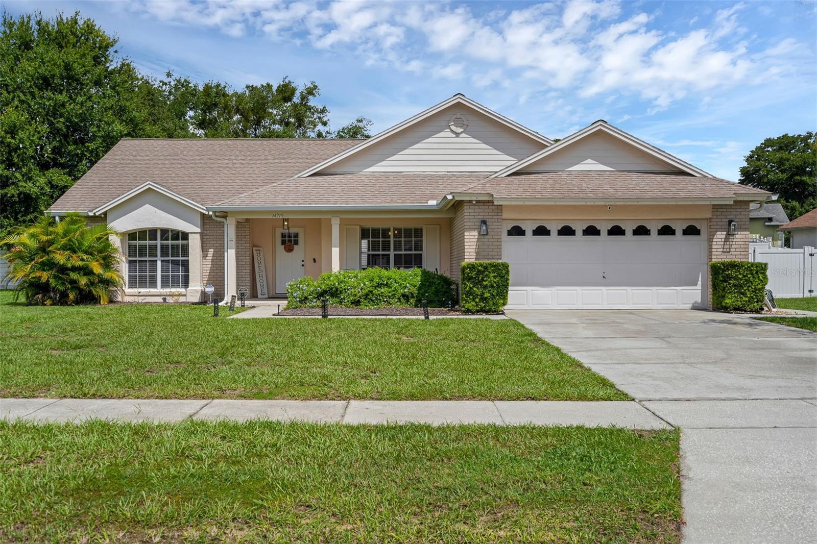 This stunning home in Clermont is ready to be your new forever home! Beautifully maintained with 3 bedrooms and 2 bathrooms in one of the area’s most desirable school zones, this home offers 1,846 sq. ft. of spacious living area, with families here enjoying zoning for Lost Lake Elementary, East Ridge Middle, and East Ridge High. Plus the bonus of a community bus to Imagine K-8 Charter School! This property offers the perfect blend of style, comfort, and location, set on an oversized 0.37-acre lot with a LOW HOA, so you can live a true Central Florida lifestyle with ease. From the charming front porch, step inside to find a formal dining room to the right and a formal living room (or ideal home office) to the left, giving you the flexibility to host elegant dinners or work from home in style. The heart of the home features soaring ceilings, abundant natural light, and a seamless flow between the family room, dinette, and the recently remodeled kitchen, designed with both beauty and functionality in mind. Here you’ll find stainless steel appliances, crown-topped cabinetry, designer countertops, a deep single-bowl sink, and thoughtful details that make it a chef’s dream. The spacious breakfast bar and dinette provide the perfect spots for casual meals or morning coffee before heading out to enjoy the Florida sunshine. The split floor plan ensures privacy, with the primary suite tucked away on one side, complete with patio access, a generous walk-in closet, and a spa-like en suite with a soaking tub, dual vanities, and a separate shower. Two additional bedrooms and a full bath, conveniently opening to the screened-in patio, offer comfort and space for family or guests so everyone can feel right at home. Step outside and embrace year-round outdoor living on the screened patio, overlooking a huge fenced backyard that’s perfect for letting four-legged friends or little ones roam freely without worry. Just steps away from amazing community amenities, including a pool, playground, pickle ball courts and tennis courts, so fun is always at your fingertips. Located just minutes from Clermont’s vibrant shopping and dining scene, including less than 5 minutes to Clermont National and the new Crooked Can Brewery in Minneola, you have the best of Clermont close by! Additionally, you're close to major highways such as the Florida Turnpike for easy commuting, and you're within a short drive to Downtown Orlando, Disney, and the best Central Florida attractions. This home truly lets you live where others vacation. Start your next chapter in sunny Clermont and schedule your private showing TODAY!!