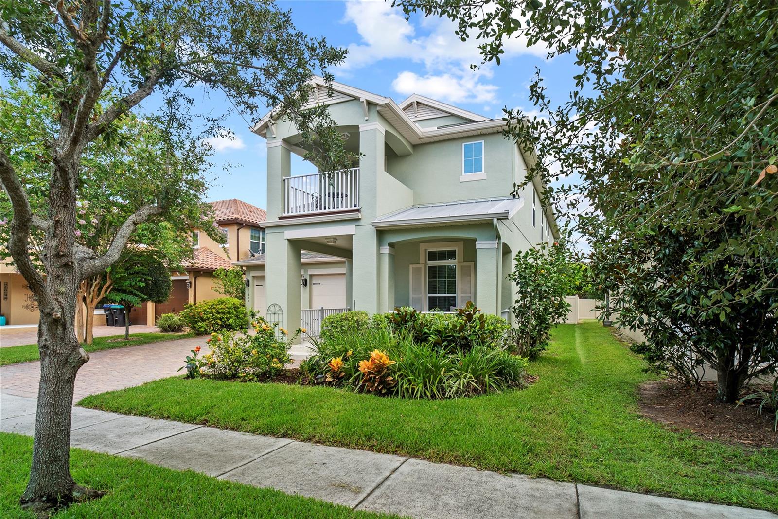 One or more photo(s) has been virtually staged. Located just 2 minutes from Disney in the sought-after Windermere Trails community, this beautifully upgraded 4-bedroom, 3.5-bath home blends elevated design with everyday comfort—all directly across from the neighborhood park and dog park. Inside, you’re welcomed by multiple expansive living spaces at the front of the home—ideal for a formal living room, dining room, home office, or library. The heart of the home features a large open-concept family room that flows seamlessly into a recently updated gourmet kitchen with a massive quartz island, brand-new stainless steel appliances, and stylish gold finishes. Just off the kitchen, a flex room offers space for dining, a home office, or a playroom. Upstairs, the primary suite boasts two walk-in closets and a spa-like en-suite bath with dual vanities, and a large walk-in shower. Two bedrooms share a Jack and Jill bathroom with two separate sinks, and a tub with shower combination, while a fourth bedroom with an upgraded full bath is perfect for guests. A fully enclosed bonus room adds even more flexibility, and already comes with a large movie screen built in—use it as a movie room, playroom, or upstairs den. A private upstairs balcony, accessible from one of the bedrooms, offers a peaceful escape to enjoy morning coffee or sunset views. Additional highlights include a NO CARPET in the entire house, a large screened-in patio, a fully fenced yard with mature landscaping, a new HVAC (2023), a whole home water softener, and fresh interior and exterior paint (2025). The home is move-in ready and impeccably maintained. Windermere Trails offers scenic walking trails, which take you around the tranquil lakes and two large ponds, and a resort-style community pool. You're also just minutes from Lakeside Village which features shopping and dining and grocery stores. Downtown Windermere is also a short drive, so you can enjoy the weekly farmers markets, and close access to the public boat ramps for the beautiful chain of lakes in Windermere. Along with all of this, you are still close to Orlando, the highways, plus it's all within walking distance to top-rated A schools.