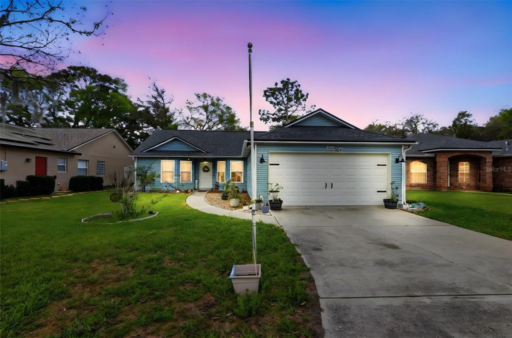 Photo of 2122 King Richards Court, Orange City, FL 32763 (MLS # V4947988)