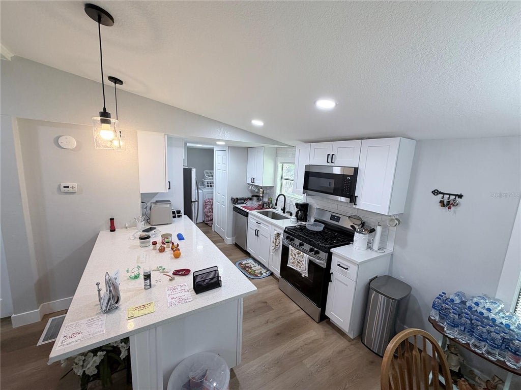 Photo of 1706 Charleston Lane, Saint Cloud, FL 34769 (MLS # OM734107)
