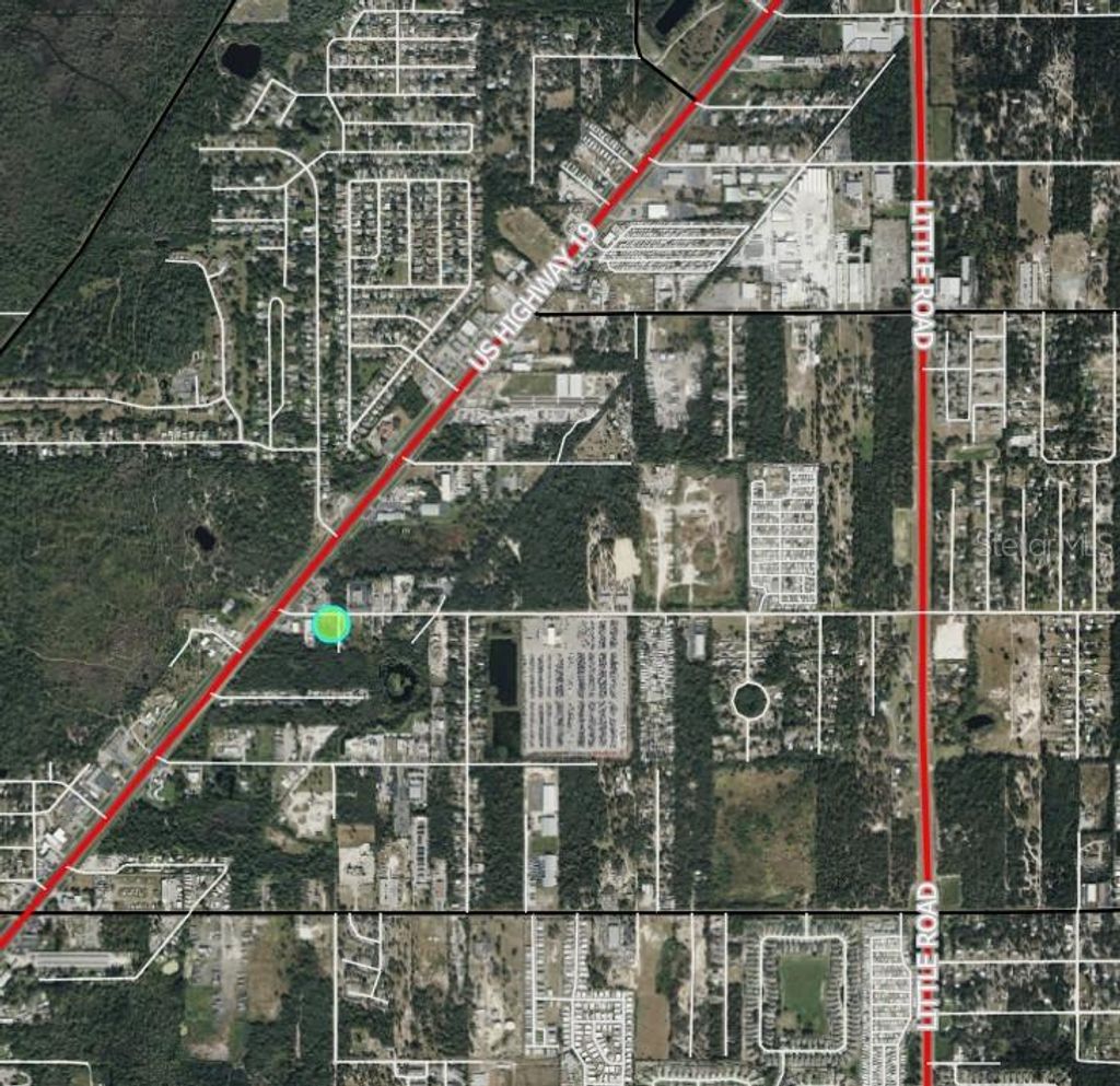 Photo of 15475 Decarolis Street, Hudson, FL 34667 (MLS # W7873588)