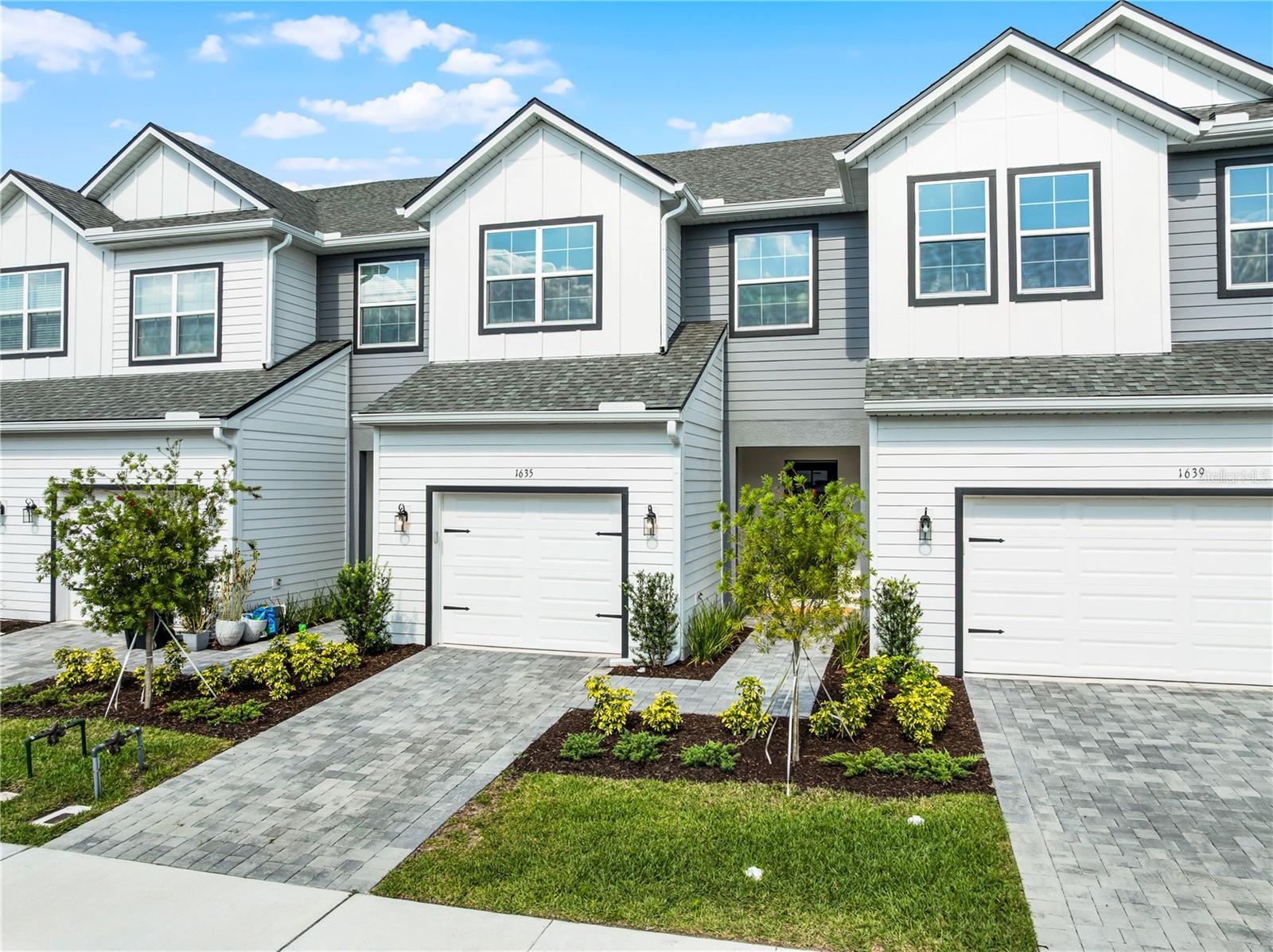 Welcome to 1635 Birchfield Cove, Oviedo, FL 32765 – A Move-In Ready, Upgraded Townhome in a Prime Location! Step into style and comfort in this better-than-new 3-bedroom, 2.5-bathroom townhome nestled in the heart of Oviedo. Located in a highly sought-after community, this stunning Riverbirch floorplan offers an abundance of upgrades, elegant finishes, and a light-filled interior with serene pool views. Inside, you’ll be welcomed by 10-foot ceilings, 18x18 ceramic tile floors, and a bright open-concept layout. The gourmet kitchen is a true showstopper with 42” Timberlake white shaker cabinetry, quartz countertops, a classic subway tile backsplash, pendant lighting, and a spacious island that’s perfect for entertaining. A wrought iron stair railing with wood treads adds a custom touch and elevates the overall design as you enter the home and head to the second floor. Upstairs, a large bonus loft with vaulted ceilings offers flexible living space, while the elegant primary suite features a walk-in closet and a beautifully appointed bathroom. Two additional bedrooms, an upgraded full bathroom, and a laundry room with custom cabinetry complete the second floor. This home is built for comfort and energy efficiency, featuring a 16 SEER variable-speed AC system, Low-E double pane windows, R-30 ceiling insulation, and R-13 wall insulation. The exterior is just as impressive with a 30-year architectural shingle roof, paver driveway, and steel-reinforced concrete block construction. A 10-year structural warranty adds peace of mind. Located just minutes from Oviedo on the Park, you’ll love the convenience of concerts, movies, food truck nights, and community events right nearby. The Cross Seminole Trail runs directly in front of the community, offering easy access to scenic walking and biking paths. Restaurants, shops, and entertainment are all within walking distance. Commuters will appreciate quick access to 417 and 408, and a short drive to UCF and Siemens. Currently zoned for top-rated Evans Elementary, Jackson Heights Middle School, and the highly sought-after Oviedo High School, this townhome offers a lifestyle that’s both stylish and smart. Don’t miss your chance to call this incredible property home—schedule your private tour today! We can promise this one has the extra upgrades you won't find in other similiary priced units.