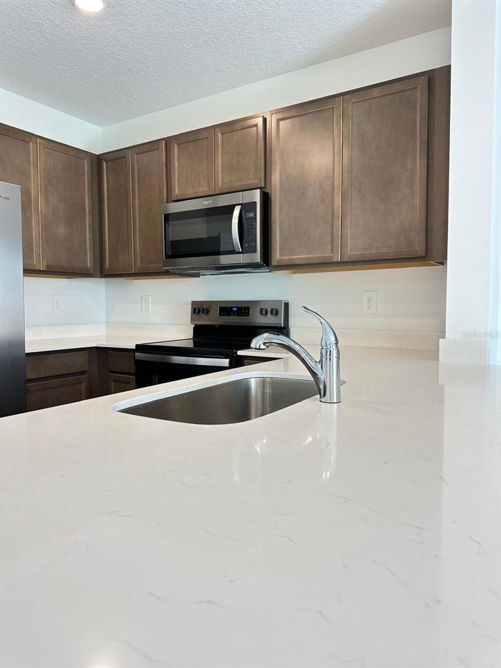 Photo of 31206 Midnight Sun Way, Wesley Chapel, FL 33545 (MLS # TB8501801)