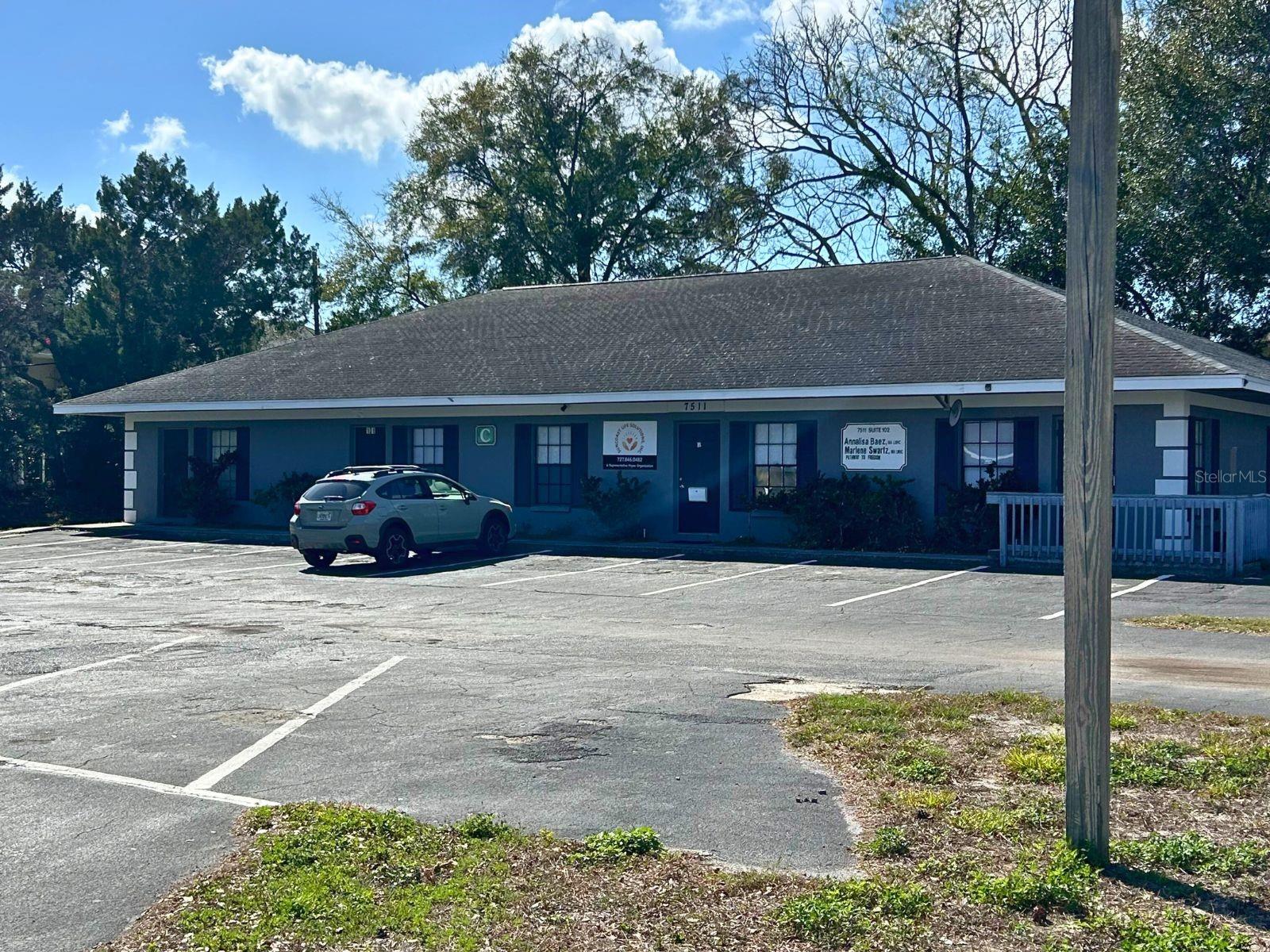 Welcome to this prime office space located just across the street from the Pasco County building. This is a high-traffic area, which means that your business will benefit from excellent visibility and exposure to potential clients and customers. The space itself boasts 6 spacious and well-appointed offices, providing ample space for your team to work and collaborate in. Additionally, there is a large and professional conference room that is perfect for hosting meetings, presentations, and other important business functions. Plenty of open parking is available on-site, you'll never have to worry about finding a spot for your car. Whether you're looking to establish your business in a high-traffic area, expand your existing operations, or upgrade to a more spacious office space, this property is the perfect solution. Don't miss out on this exceptional opportunity.