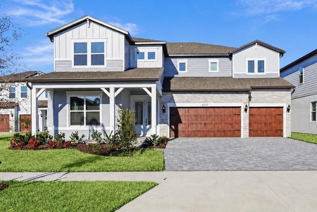 Photo of 6962 Jared Oaks Drive, Wesley Chapel, FL 33545 (MLS # TB8476478)