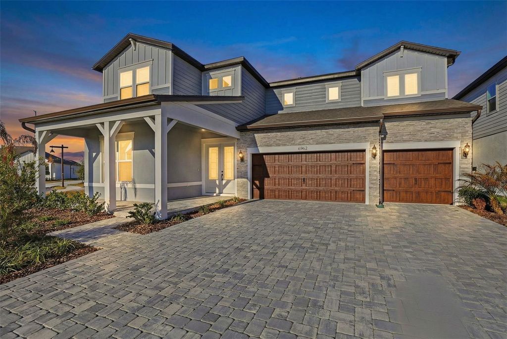 Photo of 6962 Jared Oaks Drive, Wesley Chapel, FL 33545 (MLS # TB8476478)