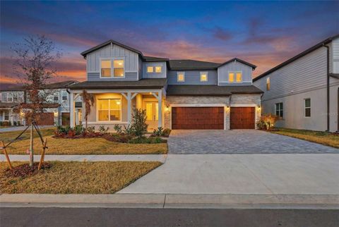 Photo of 6962 Jared Oaks Drive, Wesley Chapel, FL 33545 (MLS # TB8476478)