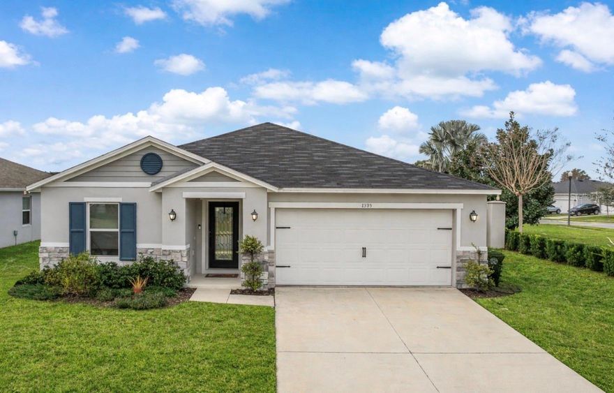 Fall in love with modern living in one of Apopka’s most popular communities. Located in the Legacy Hills neighborhood, this nearly new home features a bright, open floor plan with plenty of natural light. The kitchen is a standout with quartz countertops, white cabinets and upgraded stainless steel appliances, including a Whirlpool Café refrigerator. The kitchen opens right into the spacious living area, making it great for hosting guests or enjoying everyday life. The split bedroom layout gives everyone their own space and privacy. The primary bedroom includes a private bathroom with double sinks and a large walk-in shower! Ceramic tile flooring runs throughout the home, giving it a clean look and making it easy to maintain. Outside, you’ll find a spacious, fully fenced backyard with plenty of room to relax, entertain or enjoy Florida’s beautiful weather year-round. The neighborhood features a nearby playground and quick access to SR 429, making commuting easy. With Apopka continuing to grow and develop, this home is a great opportunity to enjoy comfortable living in a city that’s on the rise. Come see it today!