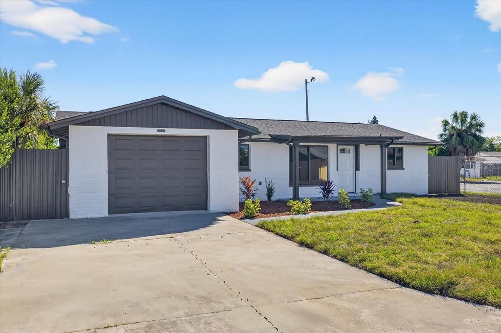 Photo of 11220 Areca Drive, Port Richey, FL 34668 (MLS # TB8437970)