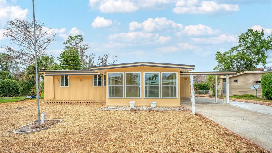 Beautifully remodeled 2-bedroom, 2-bath home available for rent in the desirable Imperial Terrace 55+ community in Tavares. This home offers a spacious open floor plan with luxury vinyl plank flooring, fresh interior and exterior paint, and updated fixtures throughout. The completely renovated kitchen features granite countertops, an island, subway tile backsplash, and stainless-steel appliances. Both bathrooms have been fully remodeled with granite vanities, ceramic tile flooring, and sleek doorless walk-in showers with dual showerheads and rainfall features. Additional updates include a new air conditioner, water heater, windows, ceilings, drywall, subflooring, baseboards, carpet in the bedrooms, and modern ceiling fans. The exterior includes a low-maintenance rock yard. HOA fees included in rent. Conveniently located near shopping, dining, medical facilities, and just a short drive to Mount Dora and The Villages, this home is move-in ready and perfect for enjoying a comfortable Florida lifestyle.