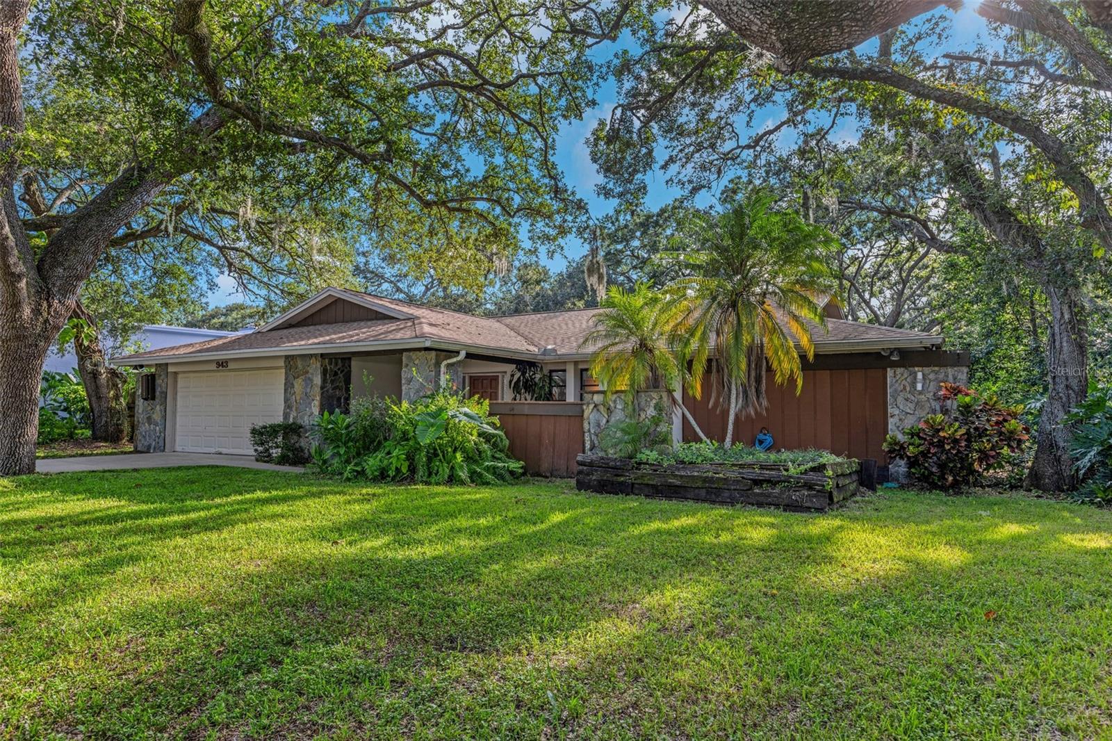 * * FANTASTIC POOL HOME * * Welcome to your Florida dream home in the heart of Clearwater! This spacious and beautifully updated 4-bedroom, 2.5-bathroom pool home offers the ideal blend of style, functionality, and indoor-outdoor living. From the moment you walk in, you’ll notice the attention to detail; a bright and large open floor plan, freshly updated interior finishes, and a cozy fireplace that brings warmth and charm to the living space. The renovated kitchen features modern cabinetry, quartz countertops, stainless steel appliances, and a breakfast bar that opens seamlessly into the enormous living room, creating an ideal space for entertaining or everyday living. The oversized primary suite offers a peaceful retreat with an en-suite bathroom, generous closet space, and direct access to rear patio and pool with large sliding doors. Step outside to your private, screened-in pool and covered lanai; the perfect spot for family gatherings, relaxing weekends, or al fresco dining year-round. Additional features include a 2-car garage, split bedroom floorplan, updated luxury vinyl flooring throughout, stylish light fixtures, and indoor laundry room. Situated in a quiet, established neighborhood, this home is just minutes from top-rated schools, parks, shopping, dining, and Clearwater’s world-famous beaches. Enjoy all that Palm Harbor has to offer. Just 15 minutes from downtown, the wonderful restaurants and Sunderman Sports Complex and Sunderman Baseball Complex * * Boater? Multiple marinas close including Home Port Marnina * * 20 minutes north and you are at Tarpon Springs and the world-famous sponge docks. 20 minutes south and you are at the Small and Quaint community of Dunedin which offers wonderful restaurants, marina, central park with stage for concerts and movies and much more! WANT BEACHES? ? Just 20 minutes away from Dunedin Causeway which gives you access to beautiful Honeymoon Beach and Caladesi Island! Voted #1 Beach in the Nation. You are also just 30 minutes from Clearwater Beach and their World-Famous White Sand Beaches. LIKE BASEBALL? Dunedin is the home of Toronto Blue Jays spring training and triple AAA baseball facilities. Clearwater homes the Philadelphia Phillies and just 30 minutes away is the New York Yankees facilities. * * PLEASE NOTE * * it is buyer's responsibility to verify all information.