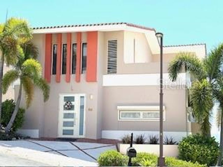Exquisite Three-Level Mansion in Palmas del Mar !!!

Discover the elegance of this stunning three-level residence, perfectly positioned on one of the highest points of Palmas del Mar to capture spectacular panoramic ocean views from multiple areas of the home.

Featuring three spacious bedrooms, two full baths and two half bathrooms, this property combines comfort and sophistication. Enjoy refreshing cross-ventilation that enhances the natural flow of Caribbean breezes, while the gourmet kitchen with granite countertops provides the perfect setting for both casual dining and elegant entertaining. The kitchen features stainless steel appliances. Also a gas generator provides peace of mind. This residence has a designated area for installing an elevator if needed. It also features storm shutters and a water purification system. This unique property offers open spaces designed for creating lasting memories with your family, enhanced by natural ventilation throughout. 

Set on two expansive lots of 620 square meters, that allows room to expand with multiple outdoor areas or even add a pool to make it your private oasis. This charming home offers an unmatched sense of privacy and space, surrounded by the beauty of one of the most exclusive neighborhoods within Palmas del Mar, Humacao—a world-class, resort-style community.

 Explore miles of scenic golf cart paths, tee off on two championship golf courses, or set sail from the world-class marina. For the active lifestyle, enjoy the equestrian center, tennis and pickleball courts, and a wide selection of dining and shopping options. Families will appreciate the presence of The Palmas Academy, a highly regarded private, college-preparatory school serving students from pre-K through 12th grade—all within the gates of the community. Don’t miss out on this fantastic home!

Whether as a primary residence or a vacation retreat, this home embodies the very best of luxury Caribbean living.
Schedule your private tour today and experience Palmas del Mar at its finest!
