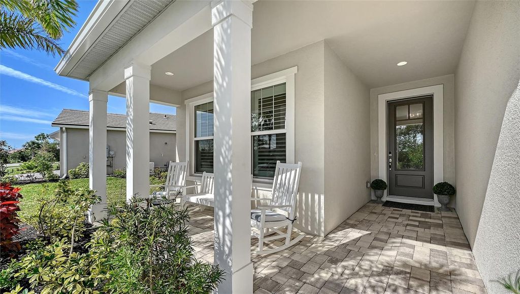 Photo of 5521 Blue Water Boulevard, Sarasota, FL 34238 (MLS # A4687351)