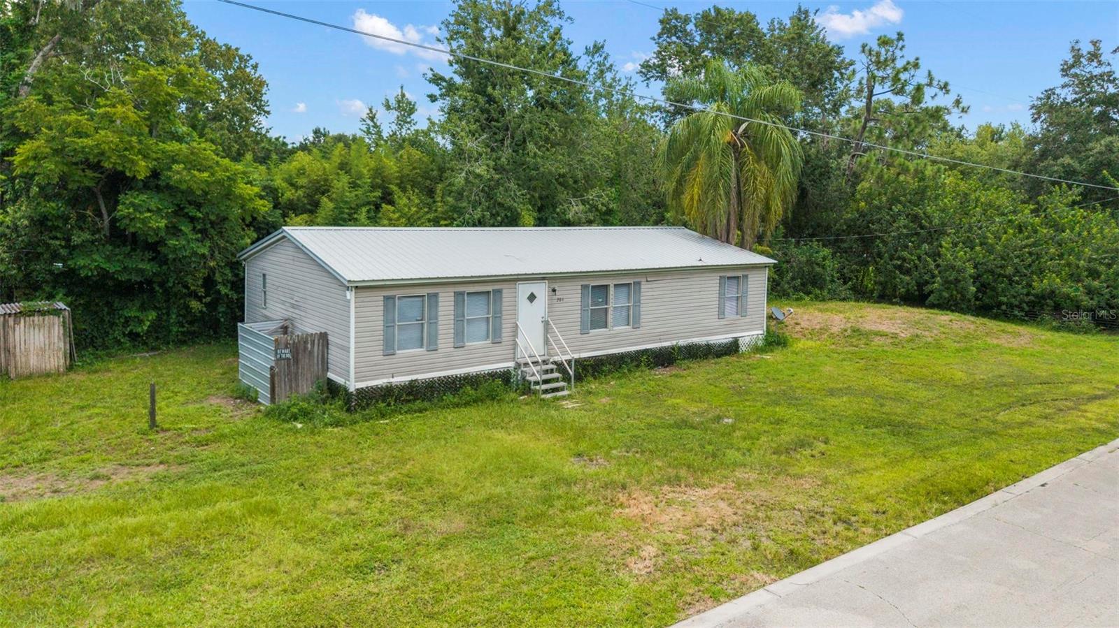 Welcome to this beautifully renovated 4-bedroom, 2-bathroom modular double-wide home, offering modern finishes and move-in ready convenience. Situated on a desirable corner lot, this home includes ownership of the land—no lot rent!
Step inside to discover luxury vinyl flooring throughout, a freshly painted interior, and updated bathrooms, including a spacious primary suite with a stand-up shower in the ensuite. The new roof adds peace of mind for years to come.
Perfectly located just minutes from 408, Waterford Lakes Town Center, UCF, and Valencia College, this property is ideal for families, students, or investors.
Don’t miss your chance to own this turn-key home in a prime location—schedule your showing today!