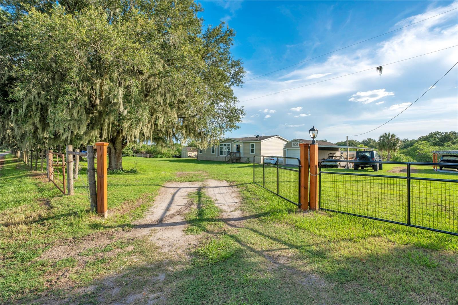 PRICE DROP! We've just reduced the price on this beautiful 13 acre property!
Welcome to this stunning lakeside estate set on 13 peaceful acres, offering a beautifully designed home with captivating views and exceptional privacy.
The property features two private lakes perfect for fishing, recreation, and relaxing in nature along with breathtaking sunrise and sunset views each day.
The residence is thoughtfully crafted, blending comfort, charm, and quality finishes, ideal for those seeking a private retreat just minutes from town. Enjoy the serenity of country living with the convenience of nearby shopping, dining, and top local amenities.
The land is horse-friendly and well-suited for future equestrian use, providing ample space and opportunity.
A true hidden gem schedule your private showing today!
