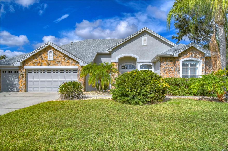 One or more photo(s) has been virtually staged. Tucked away in the peaceful, gated community of Fox Wood, this magnificent 2-story pool home is located in the highly sought-after Cameron’s Point section—offering quiet privacy, less traffic, and a true neighborhood feel. With a beautiful park right next door, it feels like you have one giant backyard, perfect for kids to play. Zoned for Trinity Oaks Elementary, Seven Springs Middle, and J.W. Mitchell High—all just minutes away—this is a home your family can grow into from kindergarten through graduation. Featuring 4 spacious bedrooms, a den, 2 living areas, a bonus room, and a huge loft upstairs, there's space for everyone to spread out or come together. The open-concept kitchen is a chef’s dream with gas cooking, a double oven, tons of storage, a hidden walk-in pantry, and a built-in desk—perfect for homework or recipes—flowing right into the cozy family room and breakfast nook with peaceful backyard views. The primary suite feels like a retreat, with sliding doors to the pool, two closets, and a luxurious bathroom with a soaking tub. The split layout offers ideal flexibility for multigenerational living or guests, with the fourth bedroom and private bonus room tucked off the main living area near the third full bath. Upstairs, a spacious loft and an additional bathroom provide endless possibilities—playroom, office, or even extra bedrooms. Step outside to your private oasis: a screened-in, heated saltwater pool and spa, a relaxing lanai, and a large side yard with a playset—plus direct access to the park next door. Add in the neighborhood playground, walking trails, and the exciting 800+ acre sports complex coming soon to Trinity, and this location is hard to beat. Not in a flood zone and packed with recent upgrades including a new roof (2021), saltwater pool system and pump (2025), two AC units (2021 &2024), central vac (2022), water heater (2015), and a water softener system—this home is move-in ready and built for everyday life. Come see it for yourself—this is more than a house, it’s where your next chapter begins.
