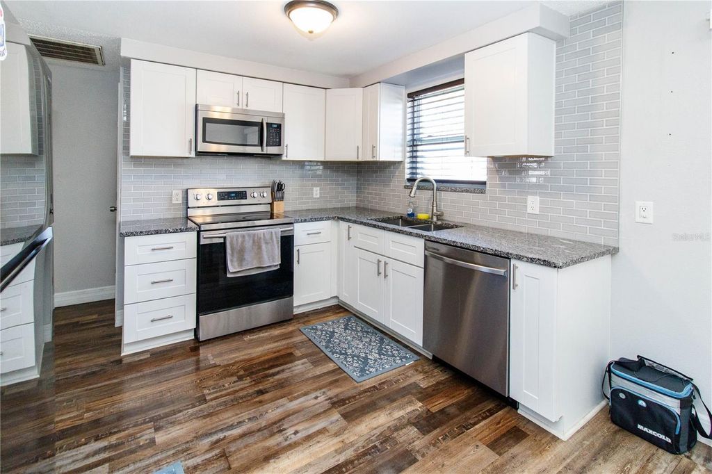 Photo of 5121 Larch Lane, New Port Richey, FL 34653 (MLS # TB8468633)