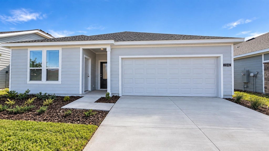 Photo of 2242 Jennio Drive, Haines City, FL 33844 (MLS # S5157743)