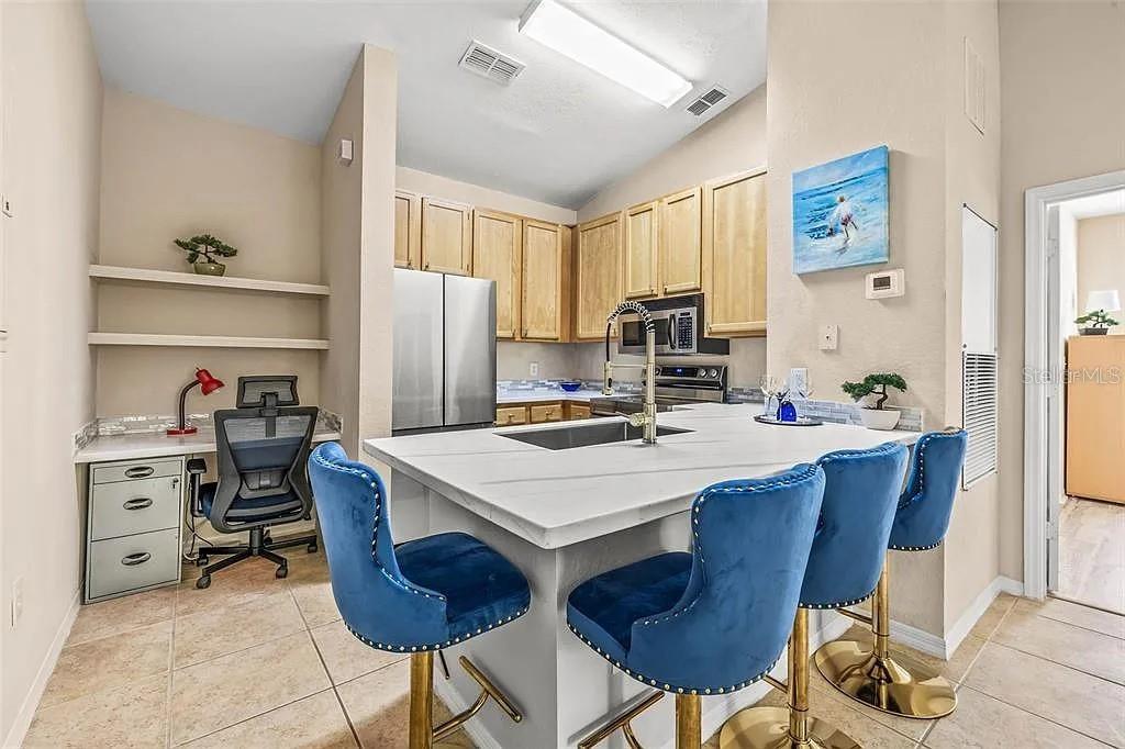 10115 COURTNEY PALMS BOULEVARD 202
