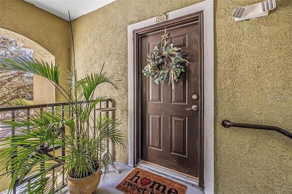 10115 COURTNEY PALMS BOULEVARD 202