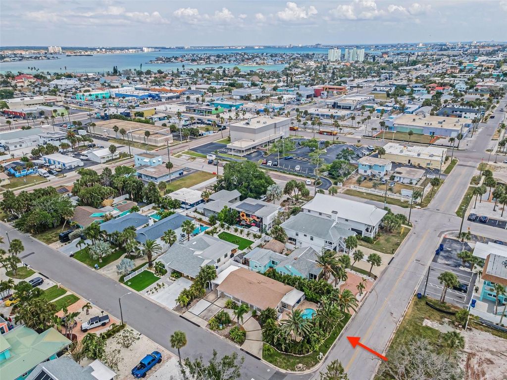 Photo of 7691 Coquina Way, St Pete Beach, FL 33706 (MLS # TB8499113)