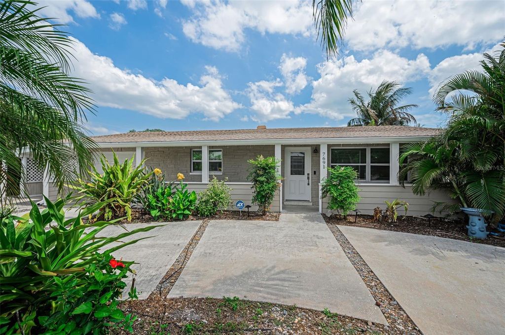 Photo of 7691 Coquina Way, St Pete Beach, FL 33706 (MLS # TB8499113)