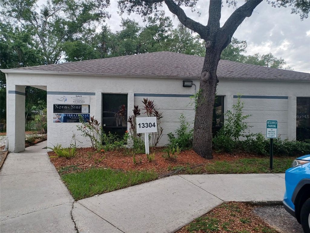 Photo of 13304 Winding Oak Court #Front, Tampa, FL 33612 (MLS # TB8525895)