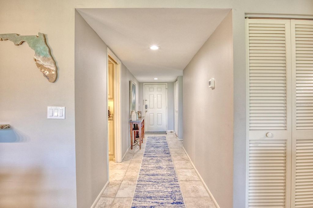 Photo of 5640 Golf Pointe Drive #101, Sarasota, FL 34243 (MLS # TB8488837)