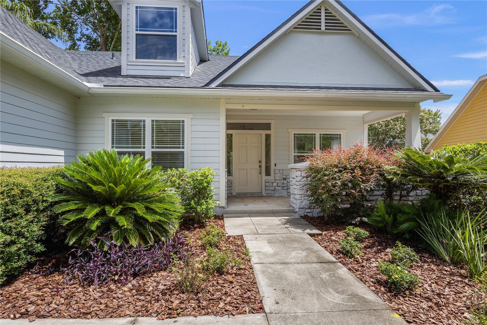 Welcome to 9216 NW 23rd Lane, a beautifully designed 5-bedroom, 3-bathroom home located on a quiet cul-de-sac in the highly desirable Brookfield neighborhood of Gainesville, Florida. Under a new roof (May 2025) with over 3,000 square feet of living space, brand new luxury vinyl plank flooring (2025) throughout, this home offers the perfect blend of comfort, space, and functionality for a growing family or those who love to entertain. The thoughtfully designed layout includes a spacious downstairs master suite complete with a walk-in closet and private porch, as well as two guest bedrooms on the main floor. Upstairs, you’ll find two additional bedrooms and a large bonus room ideal for a playroom, home office, or media space.
High ceilings, detailed woodwork, and an open-concept living area create a warm and inviting atmosphere, while the updated kitchen features quartz countertops, stainless steel appliances, and plenty of counter space for cooking and hosting. Enjoy your morning coffee on the charming front porch or unwind on the screened back porch overlooking the backyard. The home’s interior and exterior was FRESHLY painted in 2025, and the curb appeal is enhanced by brand new landscaping (June 2025) and classic architectural touches.
Brookfield is known for its family-friendly environment, walkability, and access to top-rated schools including Hidden Oak Elementary, Fort Clarke Middle, and Buchholz High. Neighborhood amenities include a community pool, playground, and sidewalks perfect for evening strolls. With its spacious floor plan, multiple outdoor living spaces, and ideal location, this home truly has it all. Schedule your private showing today and come see what makes 9216 NW 23rd Lane the perfect place to call home.