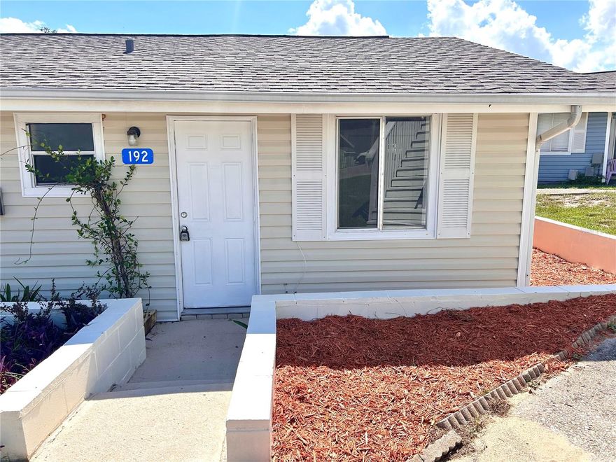 THIS BROKER OWNED CONDO IS A GREAT INVESTMENT OPPOTUNITY...BUY FOR WHAT YOU COULD RENT FOR INCLUDING YOUR HOA! Come home to serenity in the charming community of Vacation Village. This quaint 2 Bedroom 1 Bath condominium has freshly painted inside and outside walls, a brand new roof (literally just installed) and AC. Relax in front of your electric fireplace that will also help keep you warm during the winter months. Fall is in the air, enjoy your newly screened porch with sitting area. The stove and refrigerator are 1 year old. The condo is located on property that spans across many acres with beautiful trees and amenities galore, including an Olympic size heated swimming pool, shuffleboard court, pickleball/tennis court, basketball court, private boat launch/lake access to Lake Louisa, clubhouse, and more. Perfect as your own bungalow, or investment rental property as many other condos in the community have been very successful with short term rentals. HOA Fee includes: Cable/Internet, Water, Sewer, Pest Control, Termite Protection, Exterior Maintenance, Mowing/Landscaping, Property Management. Amenities include: Lake Access, Boat Dock, Boat Ramp, Heated Olympic Size Pool, Pickleball, Tennis, Shuffleboard, Basketball, Playgrounds, RV & Trailer Storage and more. Vacation Village is a Gated Community located on Lake Louisa ---- part of the Clermont Chain of Lakes. Vacation Village consists of a combination of 193 A-Frames and Villas. Just 20 minutes from Disney and the attractions; located on Hwy 27 south of Hwy 50; Close to the Clermont Trail system, Publix Plaza and across the street from the planned 250 acre Olympus Sports Complex!