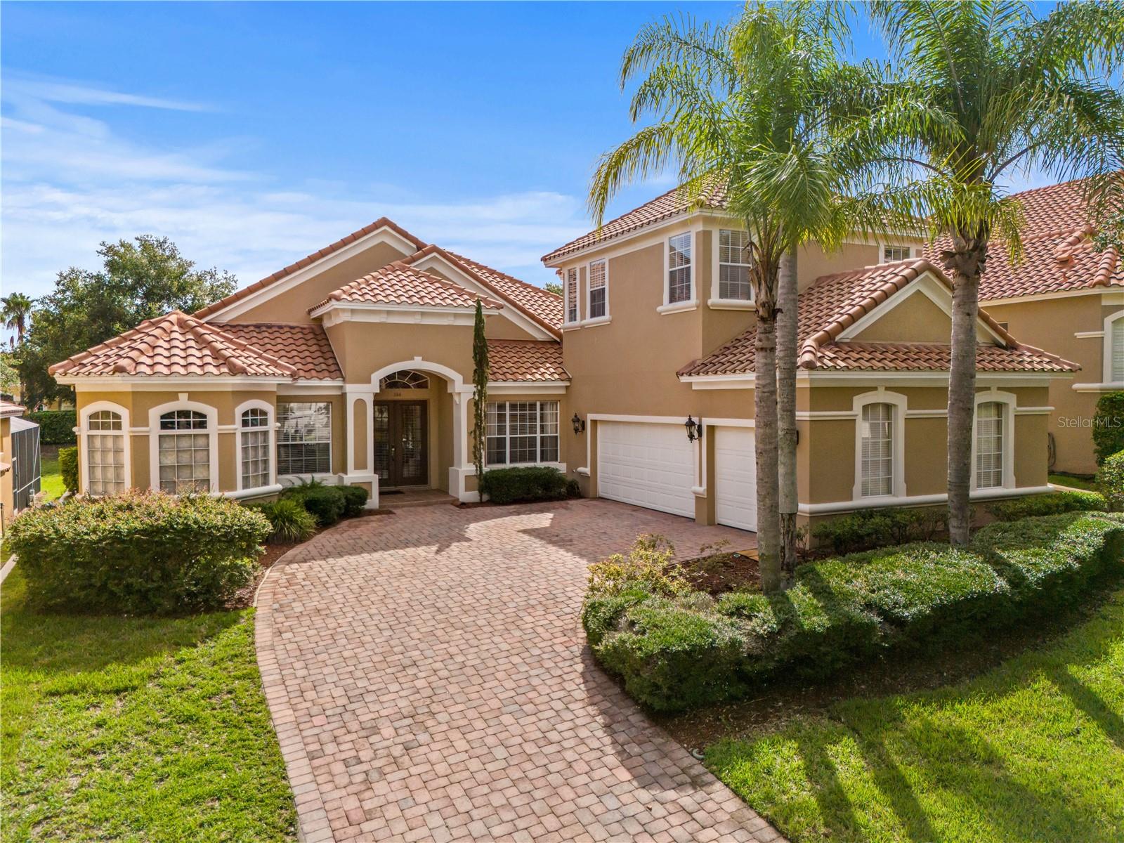One or more photo(s) has been virtually staged. Welcome to the ULTIMATE FLORIDA LIFESTYLE in this luxurious 6-bedroom, 4-bathroom pool home with over 3,300 sq/ft of living space, located in the exclusive 24-HOUR GUARD GATED Providence Golf Community. Built by AWARD-WINNING LUXURY HOMEBUILDER, ABD DEVELOPMENT, this exceptional residence blends sophistication, comfort, and function. A beautiful foyer greets you with elegance as you enter the home's wonderful layout, including a spacious formal dining room, living room, and a lovely family room that flows seamlessly into the gourmet kitchen. The kitchen features high-end stainless steel appliances, granite countertops, wood cabinetry, breakfast nook + eat-in bar. Step outside to your private, screened-in pool and spa oasis—complete with brick pavers and ideal for relaxing or entertaining guests. First-Floor Primary Suite: The expansive primary bedroom spans the entire length of the home and has a big walk-in closet and luxurious en-suite bath with walk-in shower, soaking tub & dual vanities. Four more generously sized bedrooms and two additional full bathrooms are located on the main floor, offering flexibility for family, guests, or office space. Upstairs, you’ll find the sixth bedroom and fourth full bath, perfect as a bonus room, home theater, or private guest suite. Additional Highlights: 3-car garage with extended brick paver driveway - elegant architectural details: tile roof, crown molding, tray ceilings, and designer lighting and fans. Inside laundry/mud room. Situated on a .28-acre lot with a large backyard for outdoor fun. Community Perks: Enjoy world-class amenities including: Two resort-style pools, tennis courts, fitness center, playground, and a Mike Dasher-designed championship golf course (pay-per-round). All this just minutes from I-4, US-27, and 429 — 20 minutes to Disney, 45 minutes to Orlando International Airport, and under an hour to Tampa and beautiful Gulf Coast beaches. This home truly checks every box — space, luxury, location, and lifestyle! Don’t miss out on this incredible opportunity. Come check this one out, you'll be glad you did!