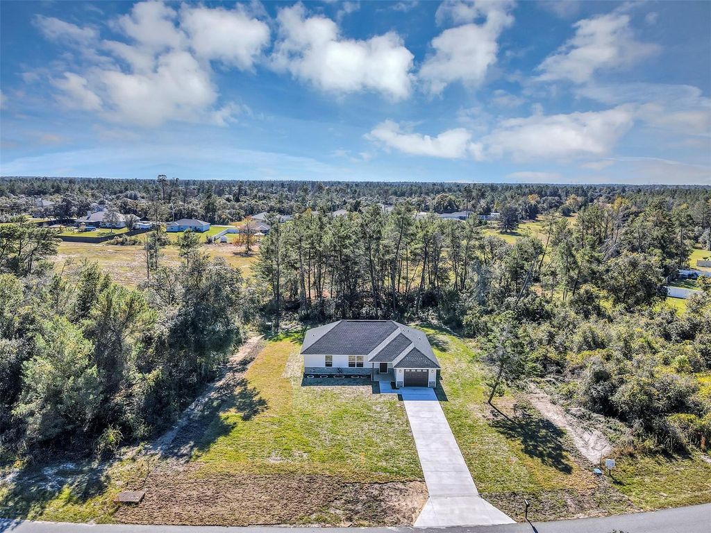 Photo of 506 Marion Oaks Golf Way, Ocala, FL 34473 (MLS # OM713313)