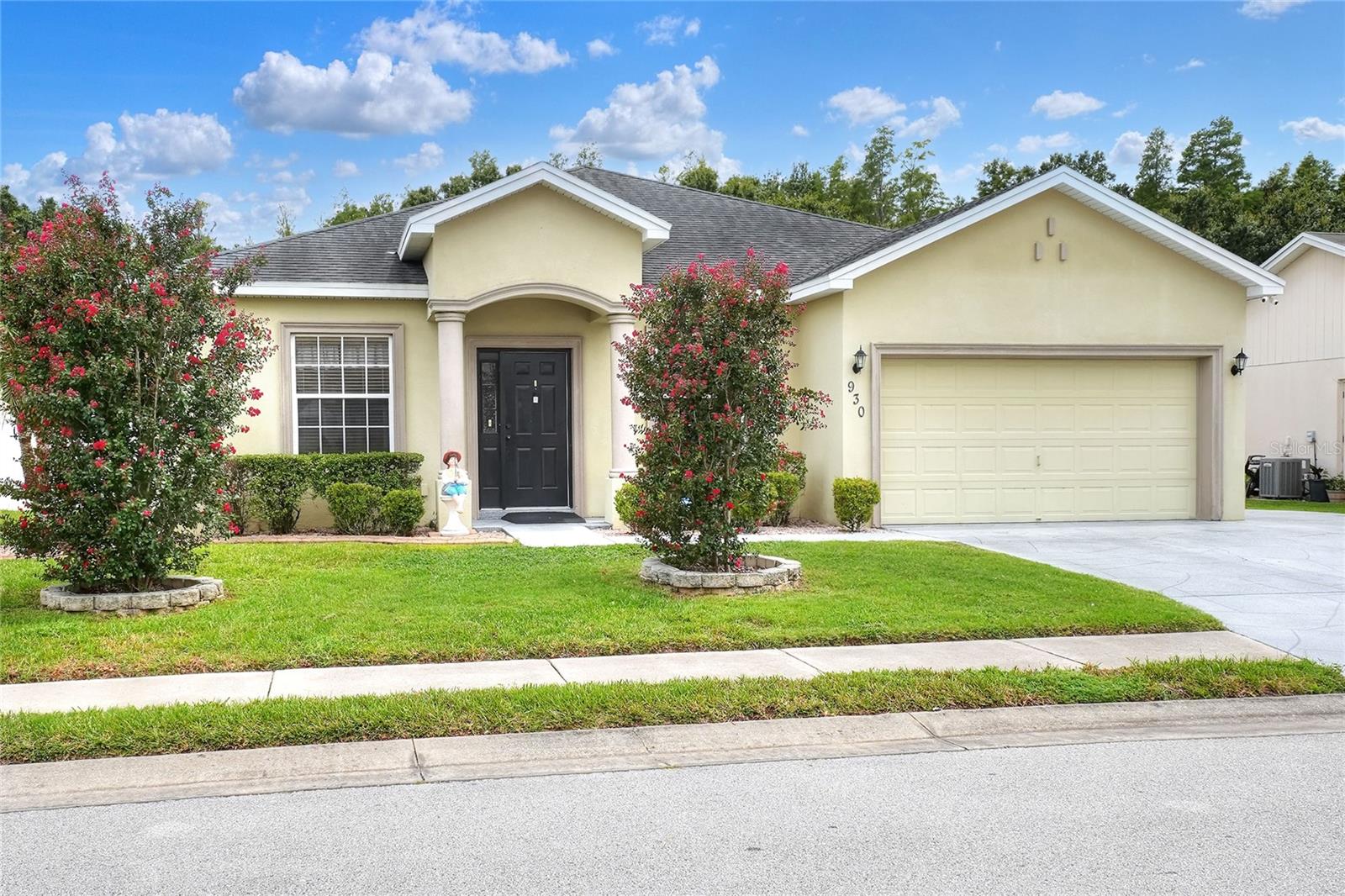 THIS COULD BE YOUR NEXT ADDRESS! EXTRA BUYER BONUS - a new roof prior to closing! This spacious 4/3 is located in the established N Lakeland Princeton Manor community and is teeming with LOADS of extras that delight! upon arrival, the expansive driveway provides plenteous parking space for your guests! The professional borders for your landscaping will minimize your work for years to come! Entering the residence, you will enter an open space, living and dining rooms respectively. Continue through to the open family room/kitchen combination. The kitchen is adorned with stainless appliances, quartz countertops, and custom cabinetry with increased storage options. The kitchen also has a built-in pantry. The bedrooms are split three ways, which make for a great multi-gen living option, office, or just bedrooms! The primary bedroom has lovely ceilings and en suite sporting a garden tub with hydro jets, separate shower and dual sinks. French doors open onto the screened lanai, perfect for entertaining, or enjoying a rest at the end of the day. The expansive screened lanai overlooks the reflecting pond with nature preserve as a backdrop. The back yard is fenced for your four footed friends, and mature landscaping as well as a sidewalk helps to keep grass out of your new home! A whole-house generator equipped with two 100 gal propane tanks can run your entire home for two weeks in the event of a power outage! The HVAC is 3 years old and has a transferable warranty. The water heater is one year old, and the water softener is one year old. Wind event? There are window coverings for all windows for increased safety! Safety?! There's a security/surveillance system, too! What are you waiting for? Give me a call for your private tour ASAP! Extras include Water softener 2024, water heater 2024, HVAC has a transferrable warranty (2021), disposal 2024 - and the whole house generator (2019) is maintained with a maintenance plan.